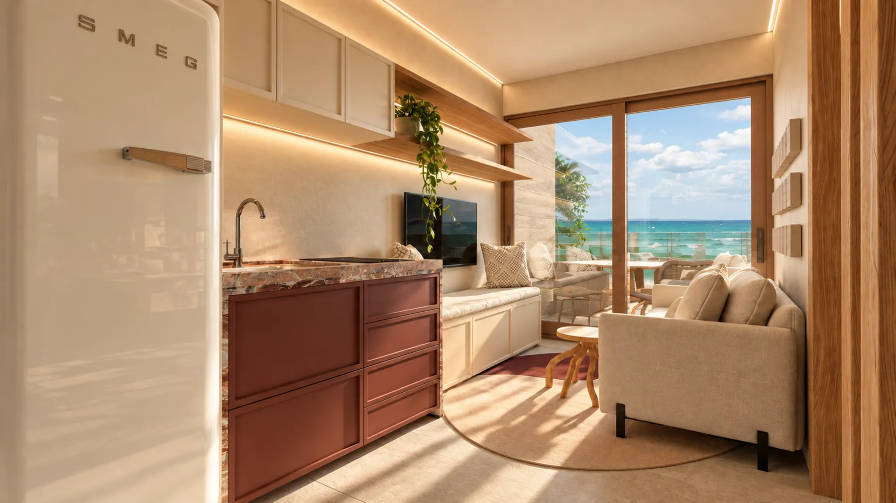 Cozinha integrada à sala, com geladeira retrô e varanda com vista para o mar